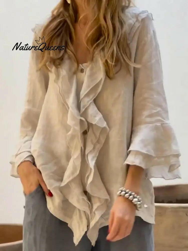 Blue women's ruffle casual cotton shirt with 3/4 sleeves by Lumina Vancouver, shown in a relaxed, stylish fit.