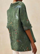 Women's casual V-neck shirt with woodland and animal print by Lumina Vancouver, featuring a green pattern and relaxed fit.