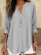 Light blue women's cotton long sleeve round neck beach shirt by Lumina Vancouver, loose fit and solid color for casual wear.