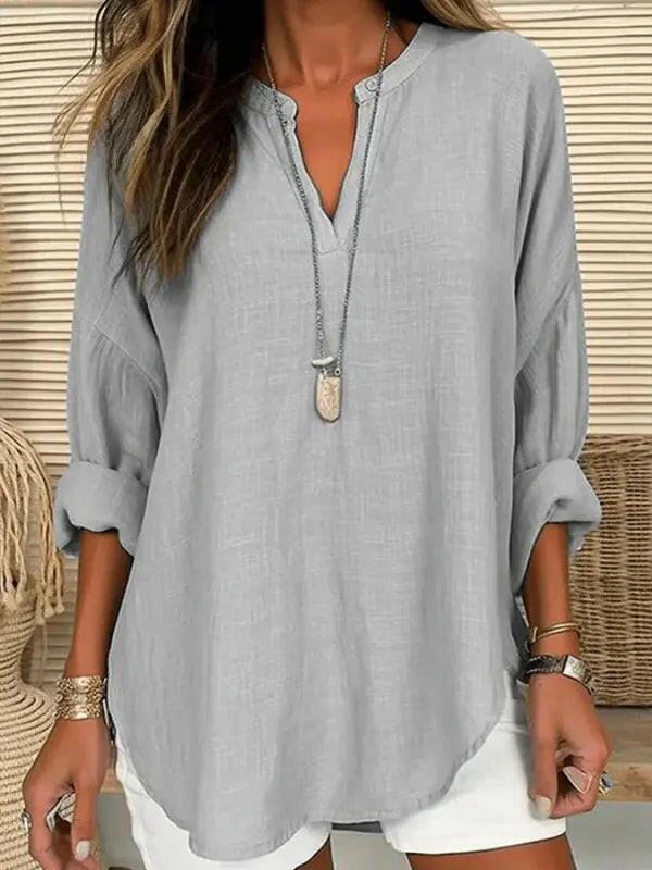 Light blue women's cotton long sleeve round neck beach shirt by Lumina Vancouver, loose fit and solid color for casual wear.