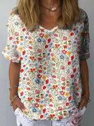Women's casual cotton shirt with pastoral floral art print by Lumina Vancouver, perfect for a relaxed, stylish look.