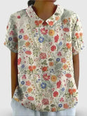 Women's casual cotton blouse by Lumina Wear featuring a pastoral floral art print, perfect for a comfortable, stylish look.