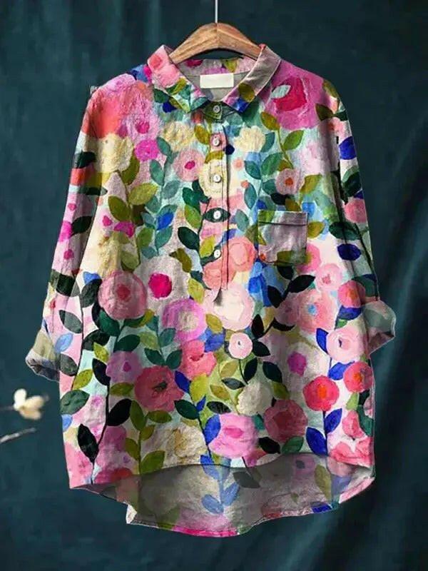 Colorful spring floral garden printed women's casual cotton shirt by Lumina Vancouver, featuring a vibrant floral design.