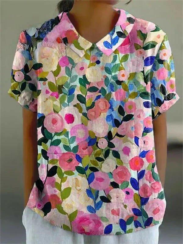 Colorful spring floral garden printed women's casual cotton shirt by Lumina Vancouver, featuring vibrant floral design and comfortable fit.