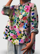 Colorful spring floral garden printed women's casual cotton shirt by Lumina Vancouver, featuring vibrant floral patterns.