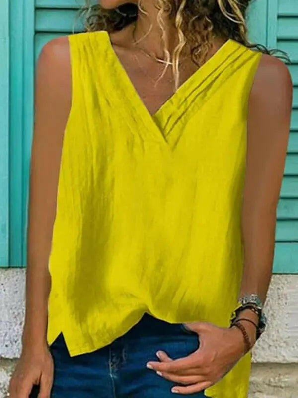 White women's sleeveless V-neck shirt with hem split from Lumina Vancouver, perfect for casual or stylish summer wear.