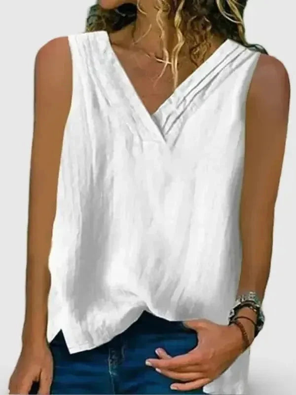 White women's sleeveless V-neck shirt with hem split by Lumina Vancouver, perfect for casual or stylish summer wear.
