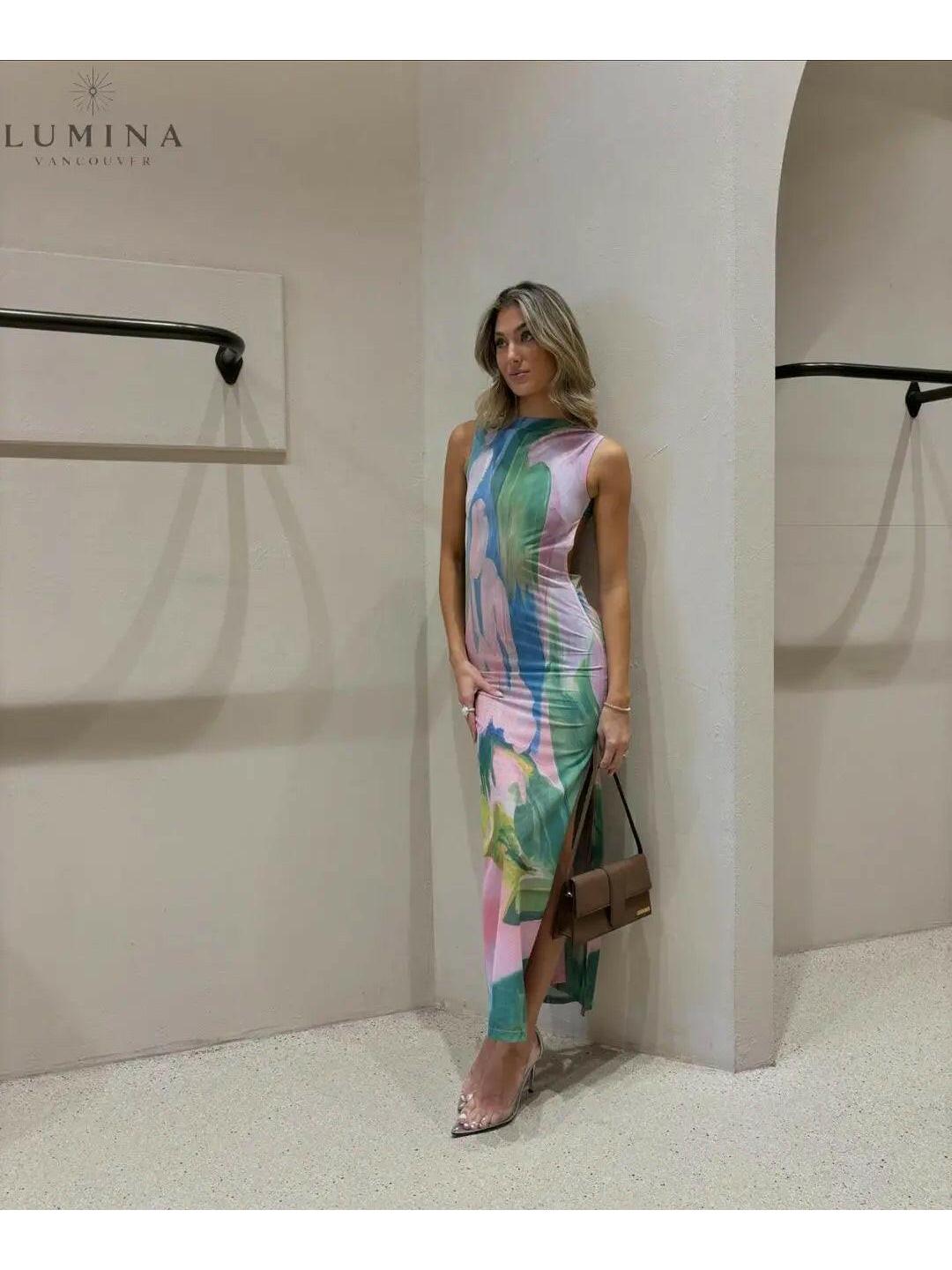 Lumina Vancouver Kyllikki Maxi Dress for wedding guest, flowing fabric, elegant design, in a soft pastel color.