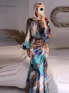 Samarah elegant pleated wedding guest dress by Lumina Vancouver, featuring a flowing silhouette and sophisticated design.