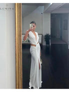 Green Layla viral summer wedding guest dress by Lumina Vancouver, featuring a flowing, stylish design perfect for summer events.