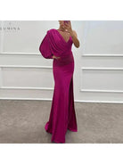 Pink Iliana one-shoulder gown from Lumina Vancouver, elegant wedding guest dress with a flowing silhouette and stylish design.