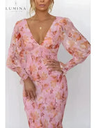 Pink Milla flower dress by Lumina Vancouver, elegant wedding guest dress with floral design and flowing fabric.