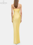 Lumina Vancouver Ursule suspender maxi dress, elegant wedding guest dress in flowing fabric with adjustable straps and a stylish silhouette.