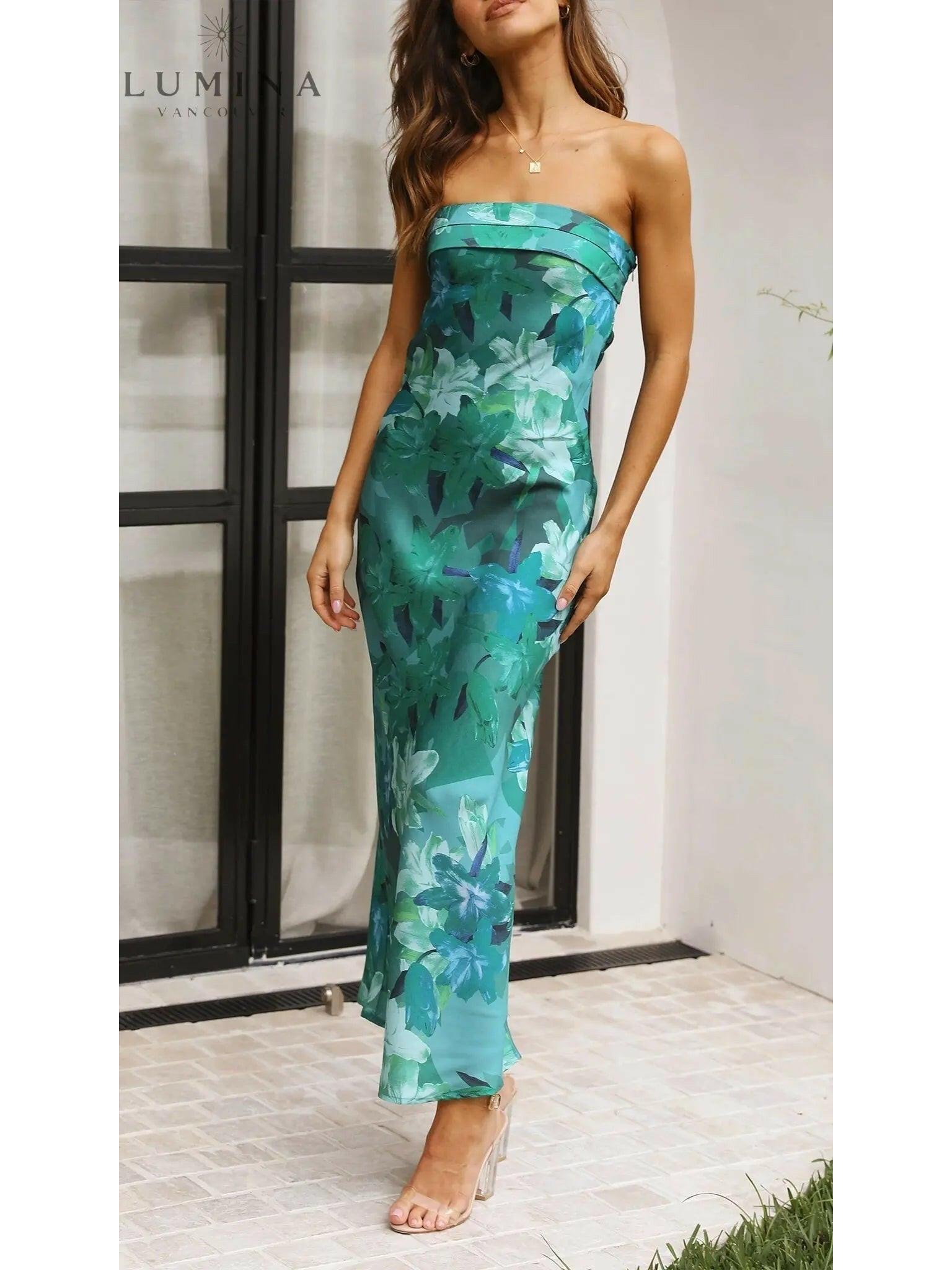 Pink Bellamy sleeveless floral maxi dress by Lumina Vancouver, perfect for wedding guest attire, shown on a model.