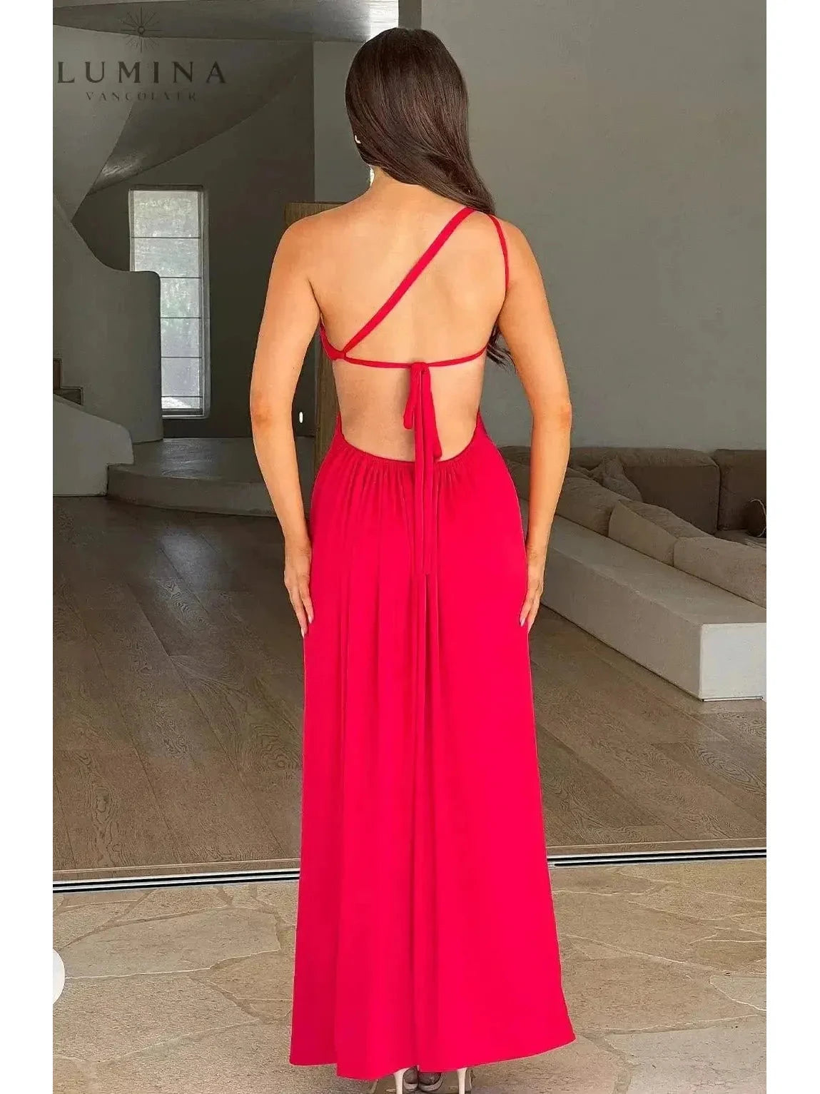 Red Adalyn maxi dress by Lumina Vancouver, elegant wedding guest gown with flowing fabric and stylish design.