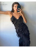 Lumina Wear Aliza ruffled maxi dress in red, flowing fabric with elegant ruffle details, perfect for wedding guest attire.