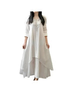 Yellow Alessia linen dress by Lumina Vancouver, lightweight and stylish, shown on a mannequin with a relaxed fit and casual elegance.