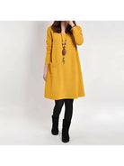 Yellow Torunn dress by Lumina Vancouver, featuring a flowing design and elegant style, displayed on a mannequin.