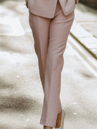 Lumina Wear Dinah pink tweed skirt suit set with pearl trim, featuring a soft pink color and tailored design, size XS.