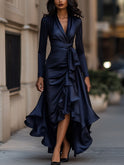 Navy blue satin maxi dress with ruffle hem by Lumina Wear, featuring a flowing silhouette and elegant design.