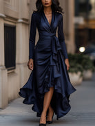 Navy blue satin maxi dress with ruffle hem by Lumina Wear, featuring a flowing silhouette and elegant design.