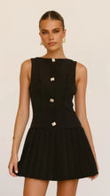 Black Luna sheer high-neck pleated dress by Lumina Wear, featuring elegant pleats and a sophisticated high neckline.