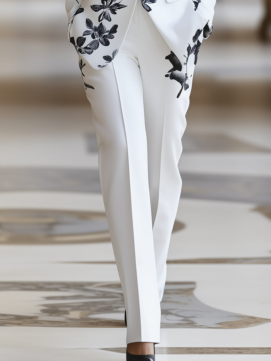 White floral printed pantsuit set by Lumina Wear featuring stylish, lightweight fabric and tailored fit perfect for elegant occasions.