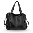 Lumina Wear Lunelle black handbag with spacious interior and versatile strap, featuring sleek design and durable material.