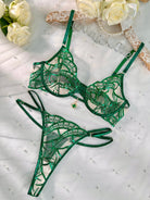 Luxe green metallic foil lace lingerie set with three pieces from Lumina Vancouver, featuring intricate lace and shiny metallic accents.