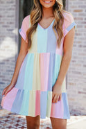 Multicolor tiered knee-length casual mini dress by Lumina Wear, featuring a flowy silhouette and vibrant design.