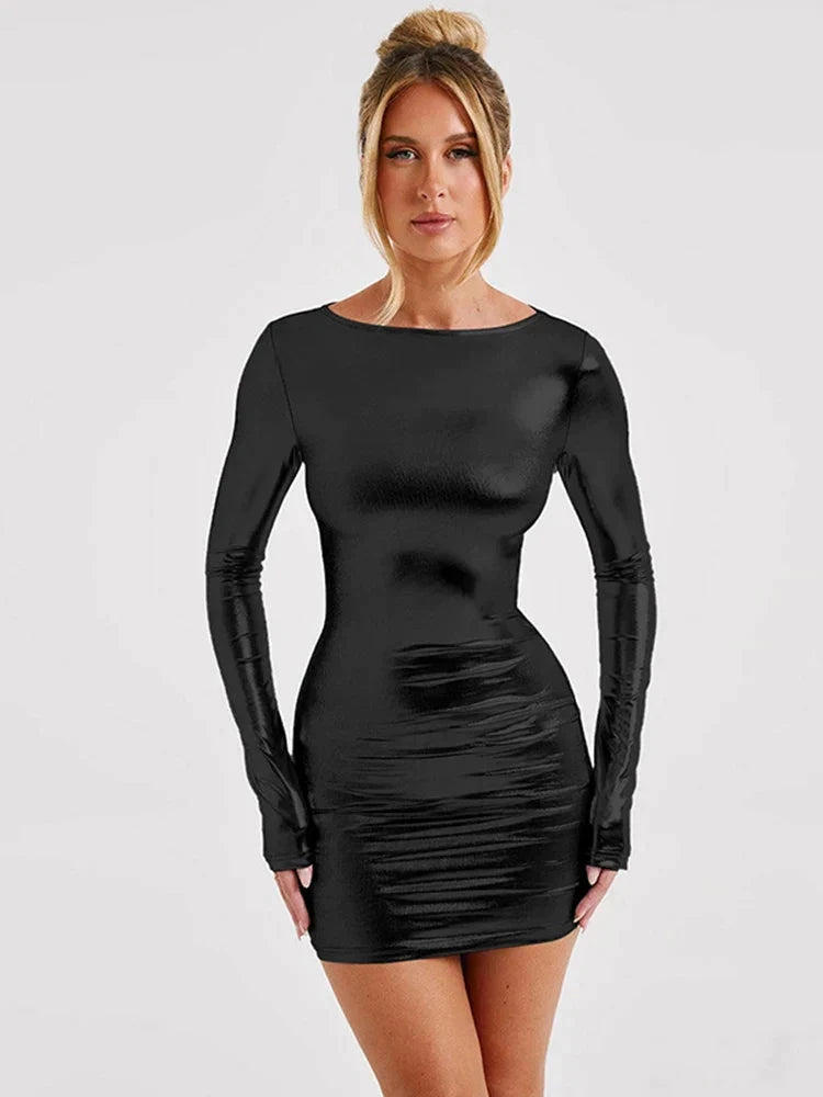 Black Therese faux leather bodycon mini dress by Lumina Vancouver, shown on a model with a fitted silhouette and stylish design.