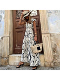 Elegant printed dress by Lumina Wear featuring a stylish design, perfect for casual or semi-formal occasions.