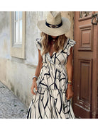 Elegant printed dress by Lumina Vancouver featuring a stylish design, perfect for dressy occasions.