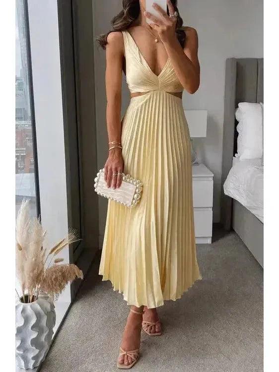 Lumina Vancouver Madeleine elegant yellow maxi dress for wedding guests, flowing fabric and sophisticated style.