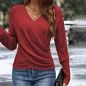 Madeline women's top by Lumina Wear featuring a flattering V-neck wrap design and relaxed fit in green.