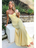 Yellow Maelys Lace-Up Sleeveless Maxi Dress by Lumina Wear, perfect for wedding guests, shown on a model.