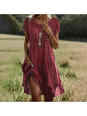 Red Maeve bohemian dress by Lumina Wear featuring flowing fabric and relaxed fit, perfect for casual and festival wear.