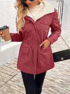 Maisie cozy Sherpa-lined parka jacket by Lumina Wear in black, featuring adjustable fit and warm, plush interior.