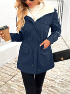 Maisie cozy sherpa-lined parka jacket by Lumina Wear in black, featuring adjustable fit and warm, plush interior.