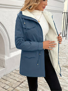 Maisie Lumina Wear cozy sherpa-lined parka jacket with adjustable fit in black, featuring a warm, comfortable design for cold weather.