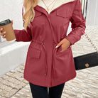 Maisie cozy sherpa-lined parka jacket by Lumina Wear, black with adjustable fit and warm interior, suitable for cold weather.