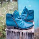 Makayla Lumina black leather ankle boots with sleek design, showcasing smooth leather and stylish silhouette.