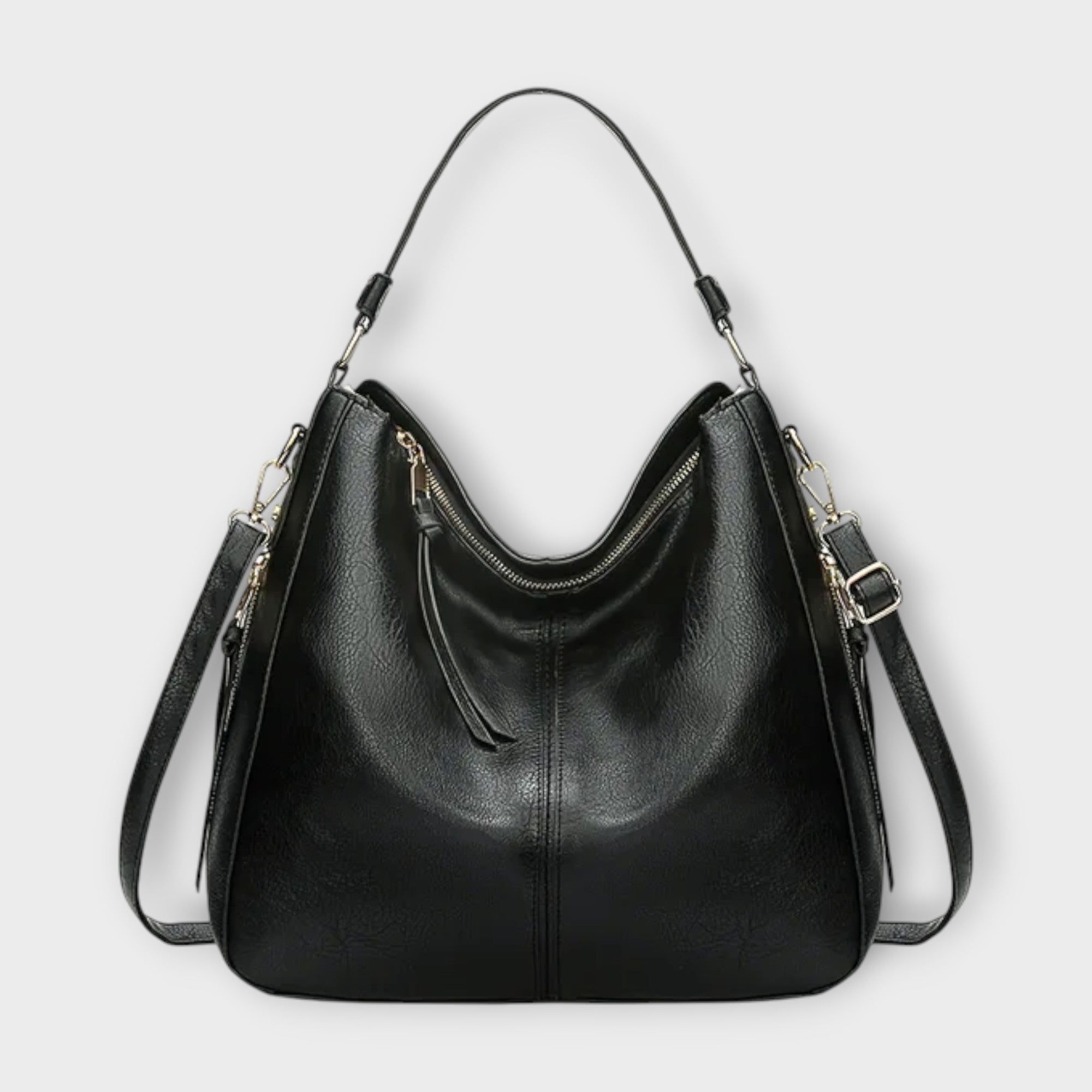 Black Lumina Wear Margaux slouchy hobo handbag with versatile straps, featuring a relaxed, stylish design and spacious interior.