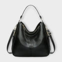 Black Lumina Wear Margaux slouchy hobo handbag with versatile straps, featuring a relaxed, stylish design and spacious interior.