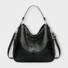 Black Lumina Wear Margaux slouchy hobo handbag with versatile straps, featuring a relaxed, stylish design and spacious interior.