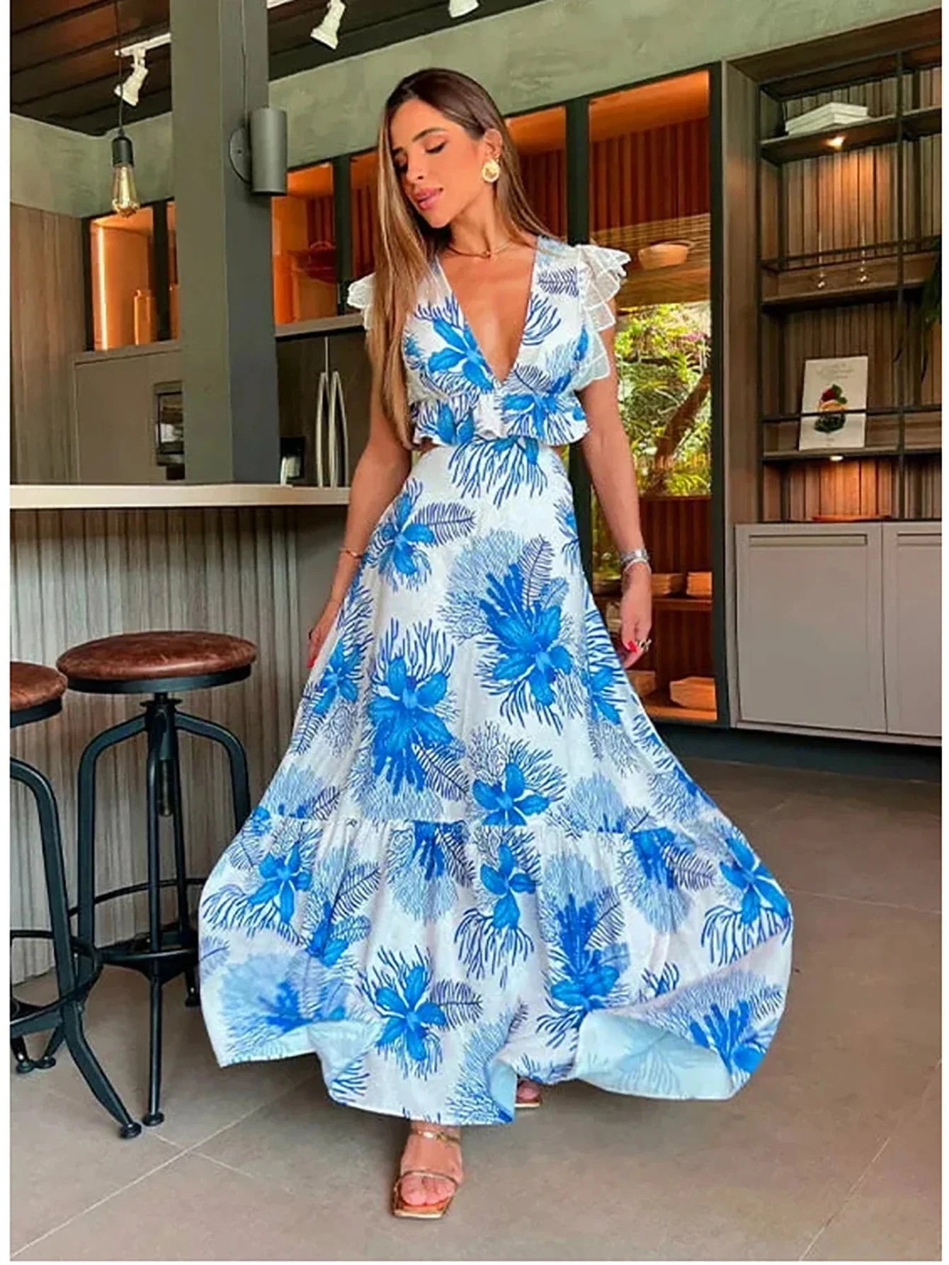 Blue sleeveless lace maxi dress by Lumina Vancouver, featuring a trendy design and elegant fitted silhouette.