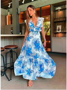 Blue sleeveless lace maxi dress by Lumina Vancouver, featuring a trendy design and elegant fitted silhouette.