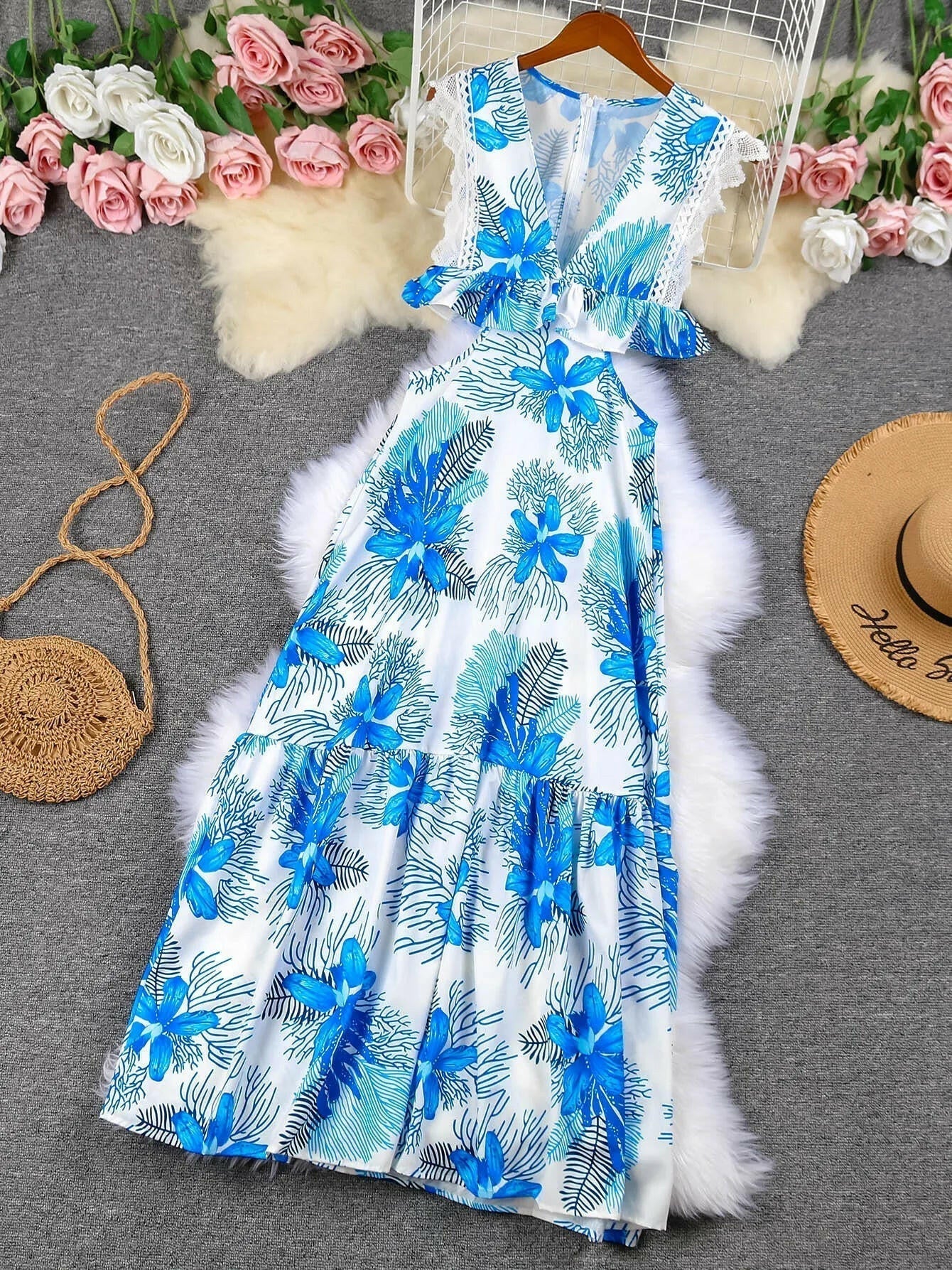 Blue sleeveless lace maxi dress by Lumina Vancouver, styled as the Margie trendy dress with a flowing silhouette.