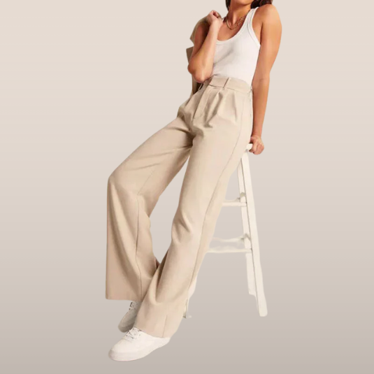 Cream high-waisted wide-leg trousers for women by Lumina Wear, showcasing a chic, relaxed fit and stylish silhouette.