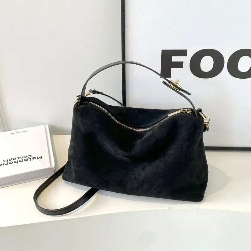 Lumina Wear Marielle textured minimalist shoulder bag with curved shape in coffee color, stylish and modern handbag.